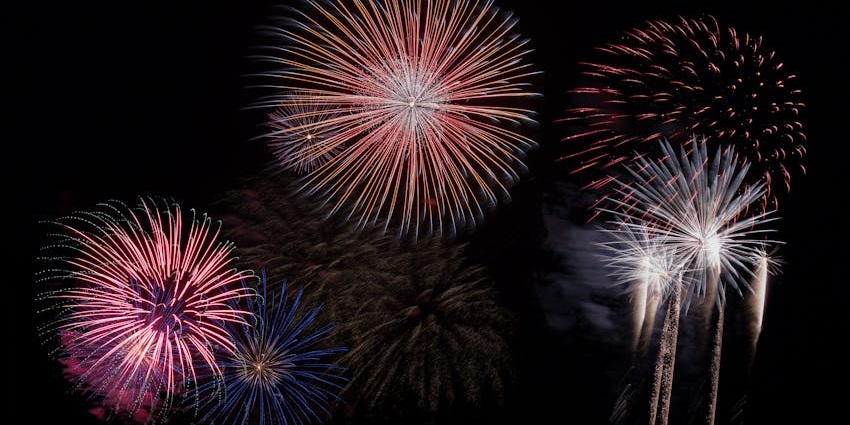Fireworks are lighting up the night sky over Pondicherry Promenade and Resorts, creating a festive atmosphere..