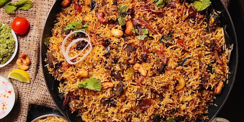 Veg biryani served hot at Shahi Darbar, one of the top veg restaurants in Guwahati.