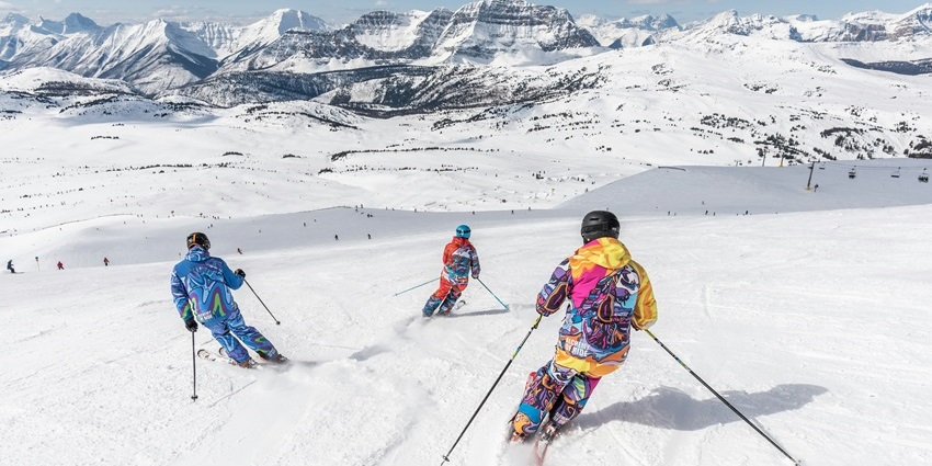A glimpse of people skiing through the quaint trails decked with pristine white snow.