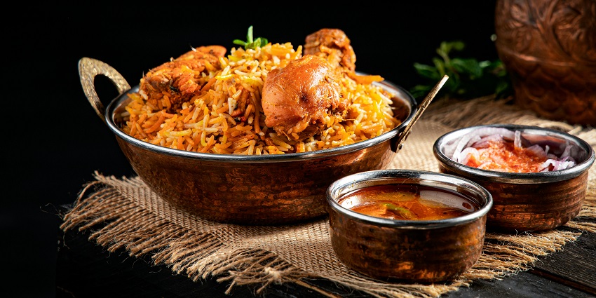 Chicken biryani served at The Great Indian Grills & Kebabs, one of the top restaurants in Six Mile Guwahati.
