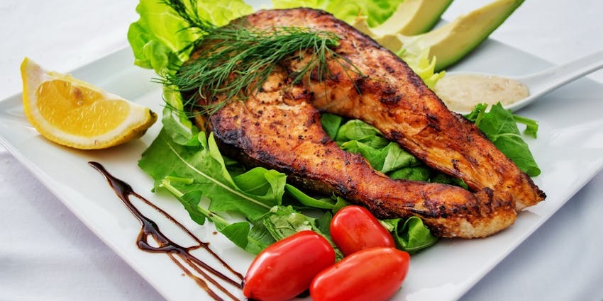 Grilled fish served at The Root Barrel, a popular choice among restaurants on Zoo Road Guwahati.