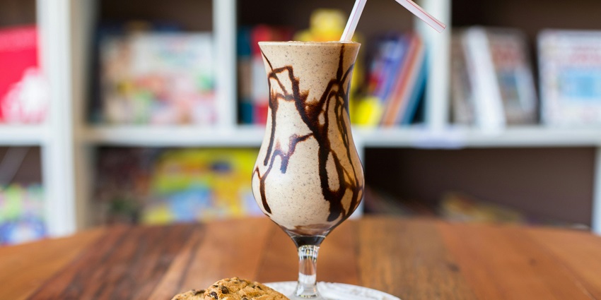 A frappe served with a chocolate chip cookie at The Table Talk Cafe.