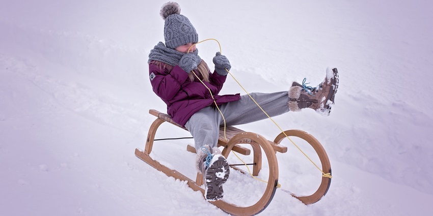 Tobogganing or sledging is a fun winter activity to try in winter in February in India.