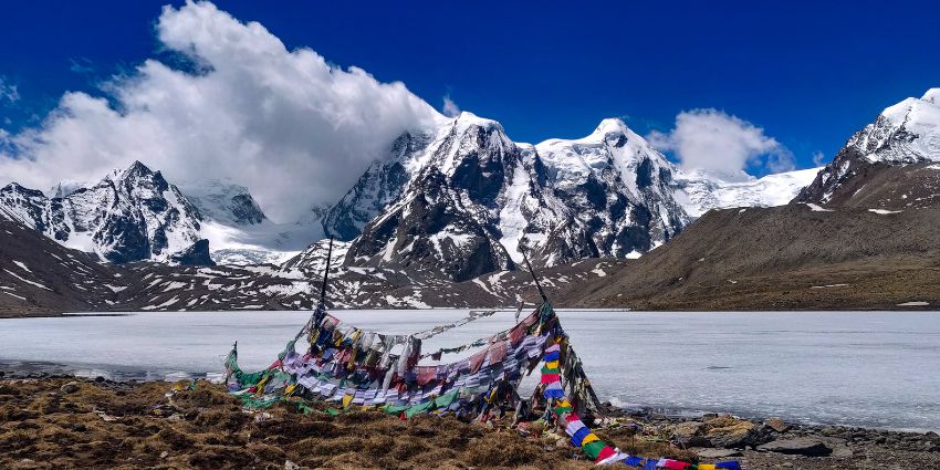 Walking on the frozen Gurudongmar Lake is one of the best things to do in Sikkim.