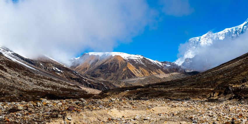 A scenic view of Zero Point (Yume Samdong) in clouds during the day in Sikkim, India.